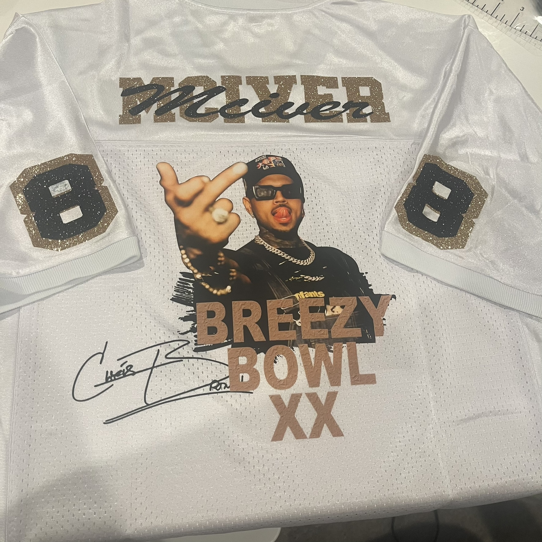 Custom white Breezy Bowl XX jersey with McIver name and gold glitter
